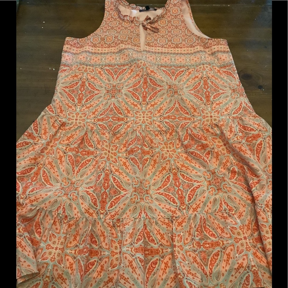 Comfortable pattern dress. A few inches above knee